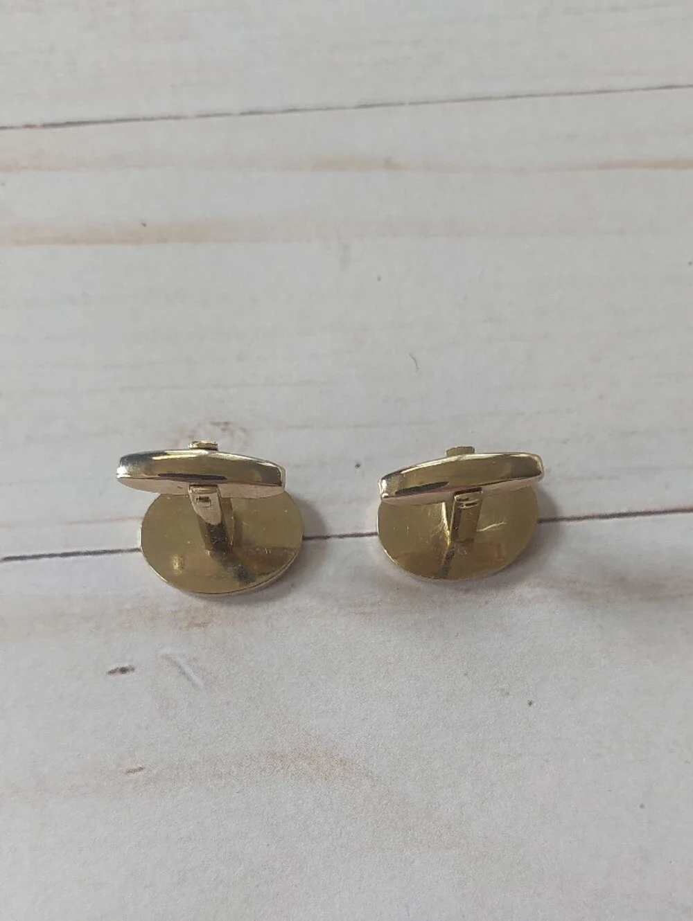 Gold-Tone Oval Cufflinks with Black Accent Border - Men's Accessories
